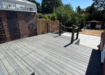 Completed garden landscaping Braintree - new decking with rope handrail leading to shed
