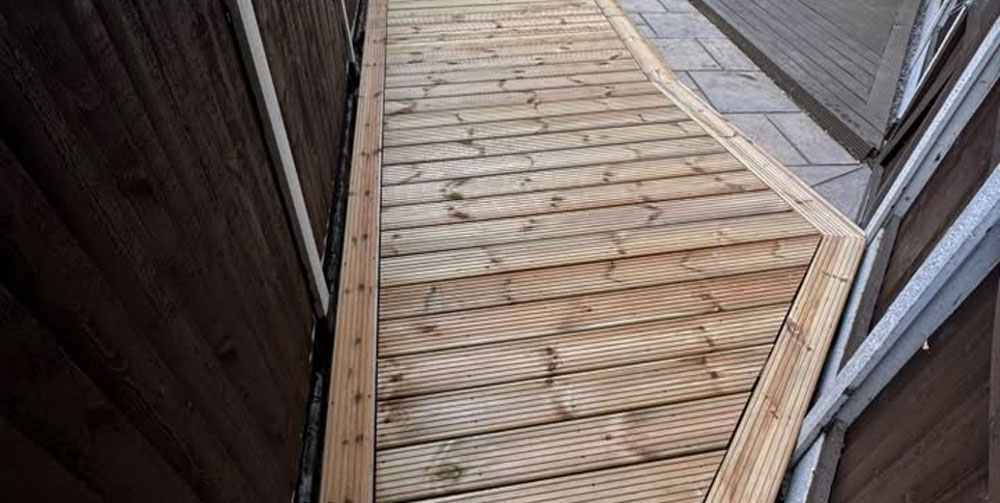 New decking installed by LNJ Maintenance after removing old rotten decking